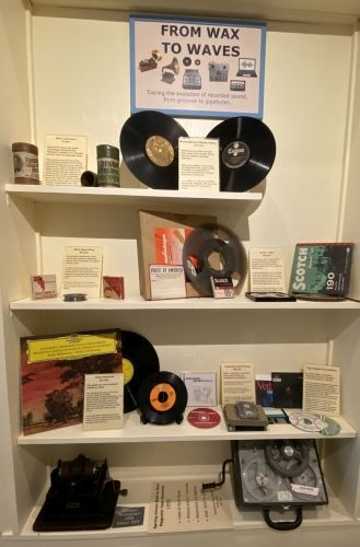 From Wax to Waves traces the evolution for the electronic recording media. Affectionaly refered to as Groves to gigabytes..